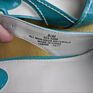 Peep toe , heel, patent turquoise in color